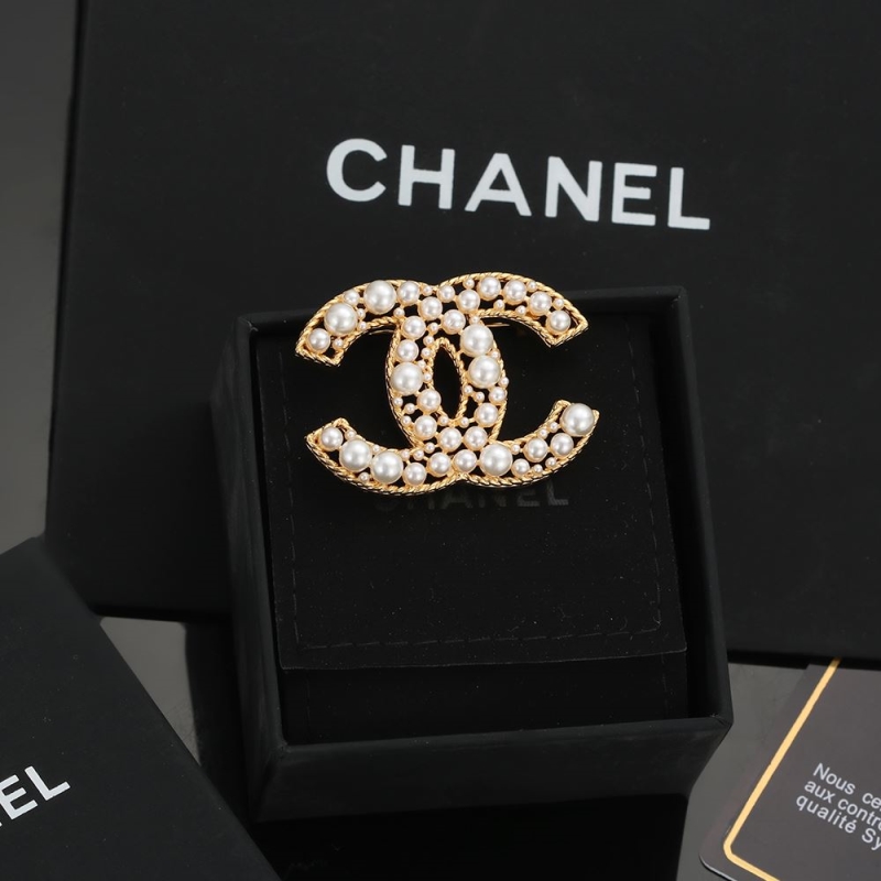Ch*el brooches